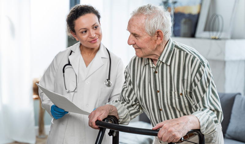Geriatric medicine — blood pressure check for an elderly patient at Suvira Hospital, Jaipur